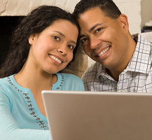 Woman and man with laptop