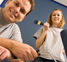 Man and woman painting