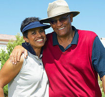 Man and woman smiling for picture