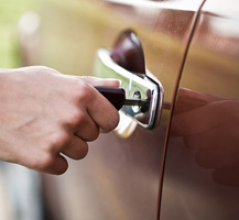 Using key to unlock car door