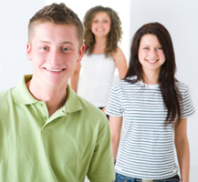 3 teenagers posing for a picture