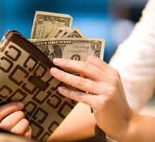 Woman getting money of a wallet