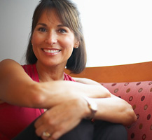 Woman sitting with arms crossed